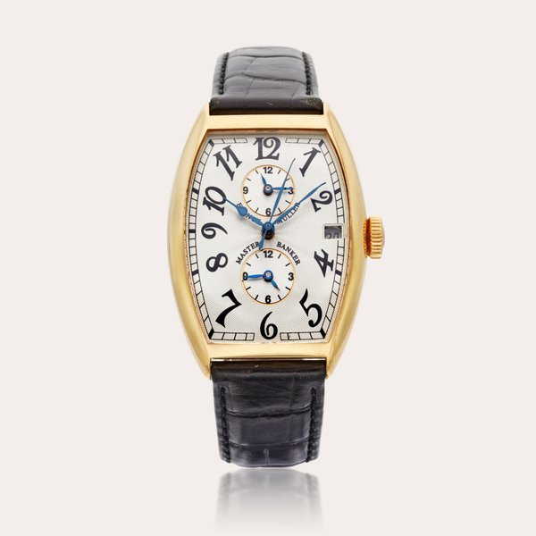 Franck Muller Reference 5850 Master Banker | A yellow gold tonneau-shaped triple time zone automatic wristwatch with date, Circa 2000