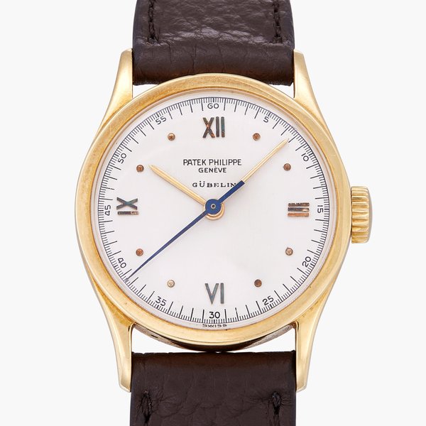 Patek Philippe Retailed by Gübelin: Calatrava, Reference 96 | A yellow gold wristwatch | Circa 1946