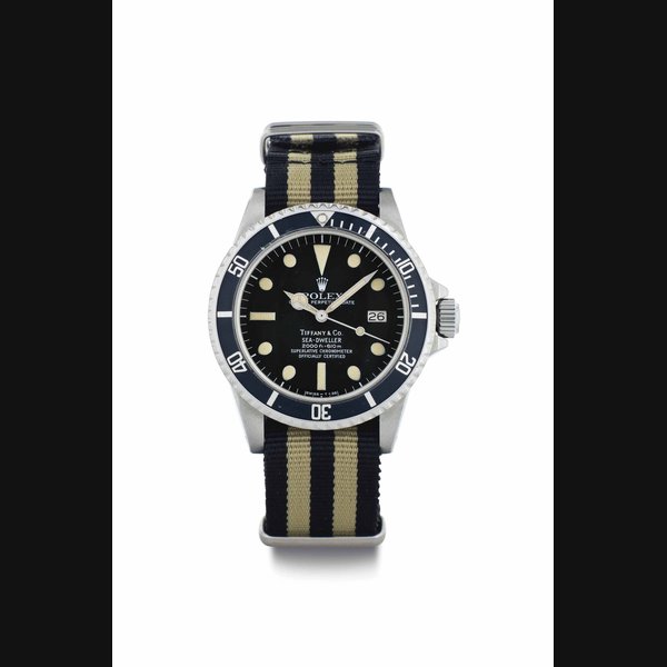 Rolex. A Stainless Steel Automatic Wristwatch with Center Seconds and Date SIGNED ROLEX, OYSTER PERPETUAL DATE, RETAILED BY TIFFANY & CO., SEA-DWELLER, 2000FT=610M, REF. 1665, CASE NO. 5'399'037, CIRCA 1977