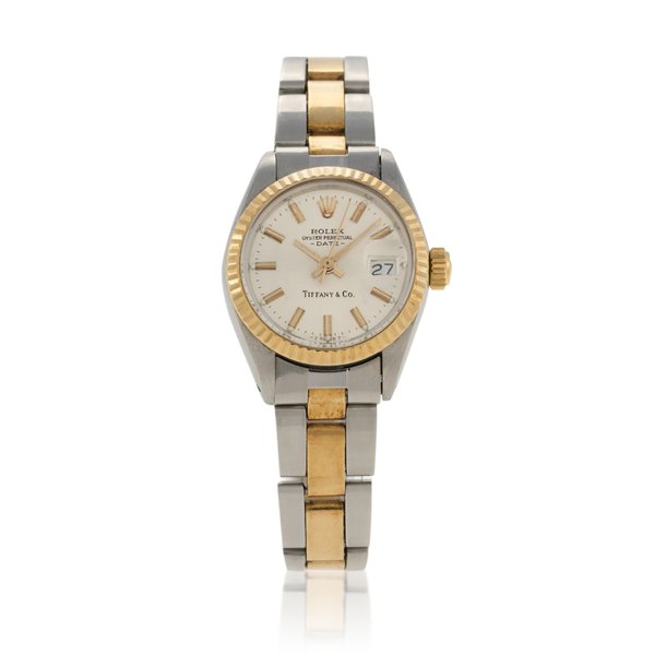 Rolex Retailed by Tiffany & Co.   Oyster Perpetual Date, Ref. 6917   Stainless steel and yellow gold wristwatch with date and bracelet  Circa 1979 · 6917