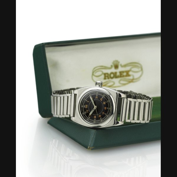 ROLEX. A RARE STAINLESS STEEL TONNEAU WRISTWATCH WITH CENTER SECONDS AND BLACK DIAL SIGNED ROLEX, CASE NO. 123226, REF. 3116, CIRCA 1935