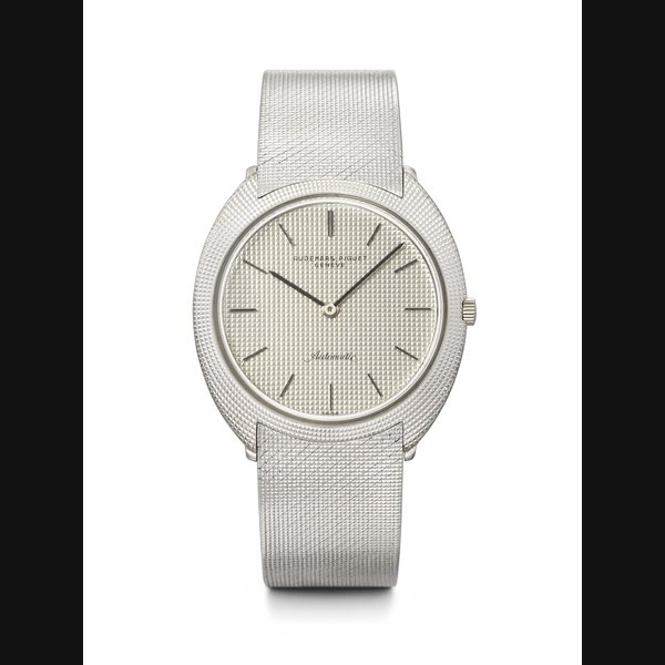AUDEMARS PIGUET. A VERY RARE AND ELEGANT 18K WHITE GOLD CUSHION-SHAPED AUTOMATIC WRISTWATCH WITH BRACELET REF. 5302BC, CASE NO. 56'157, CIRCA 1970