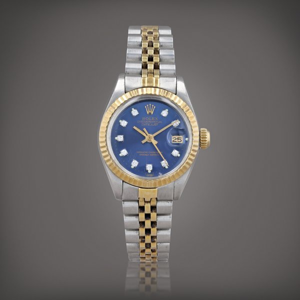 Rolex Lady Datejust, reference 6917    Montre bracelet en acier et or jaune avec index diamant et date |  Stainless steel and yellow gold wristwatch with diamond indexes, date and bracelet    Vers 1982 |  Circa 1982