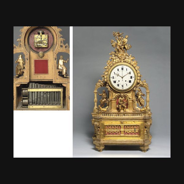  An Austrian large carved gilt-wood quarter-striking and musical organ clock with calender and pull quarter repeat LATE 18TH/EARLY 19TH CENTURY