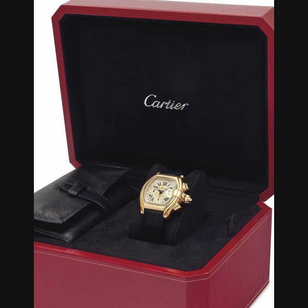 Cartier Cartier. A Fine 18k Gold Tonneau-Shaped Automatic Chronograph Wristwatch with Date SIGNED CARTIER, ROADSTER MODEL, REF. 2619, CASE NO. 53288CE, CIRCA 2003, Price & Market Data