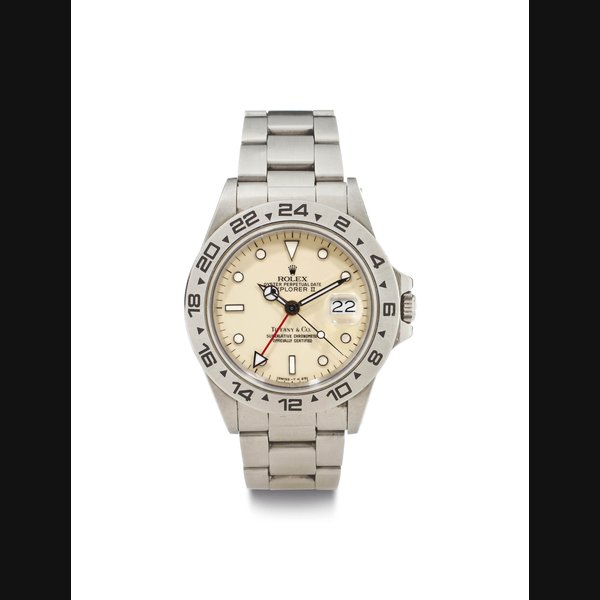 Rolex. A Rare Stainless Steel Automatic Wristwatch with Ivory Rail Dial, 24-Hour Indication, Date and Bracelet SIGNED ROLEX, OYSTER PERPETUAL DATE, EXPLORER II, RETAILED BY TIFFANY & CO, REF. 16550, CASE NO. 8'975'278, CIRCA 1985