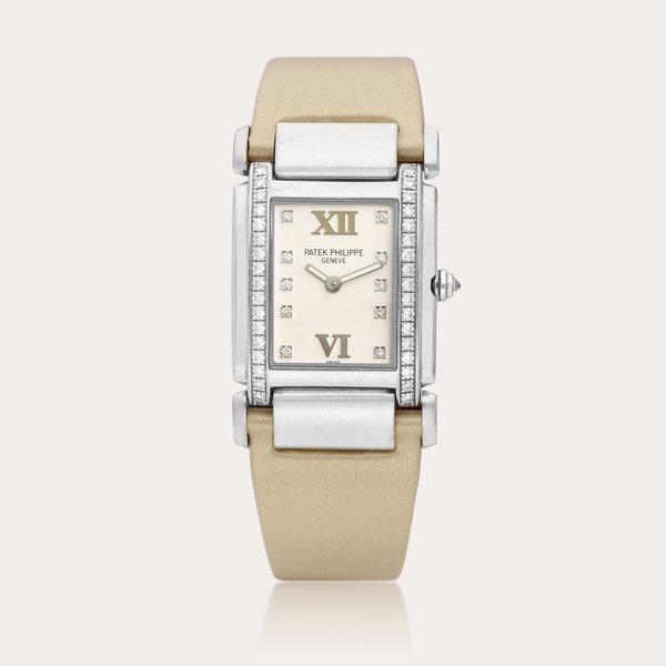 Patek Philippe Twenty~4, Reference 4920 | A white gold and diamond-set wristwatch, Circa 2004 | 百達翡麗 | Twenty~4 型號4920 | 白金鑲鑽石腕錶，約2004年製 · 4920