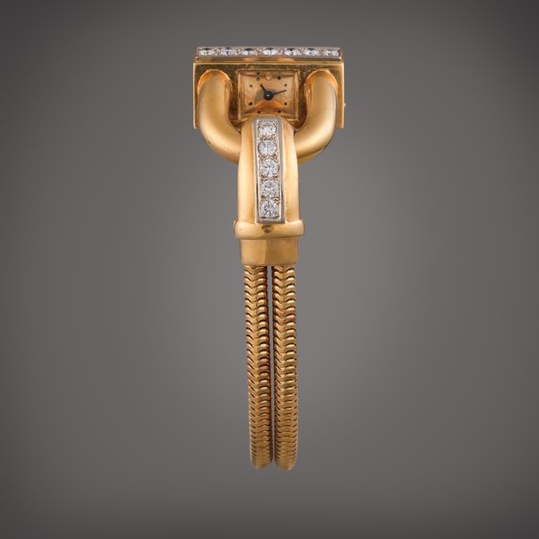 Van Cleef & Arpels Cadenas | A yellow gold and diamond-set wristwatch with bracelet, Circa 1950