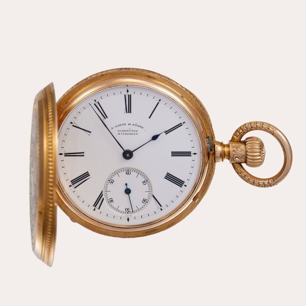 A. Lange & Söhne A pink gold and enamel hunting cased keyless lever watch | Circa 1882