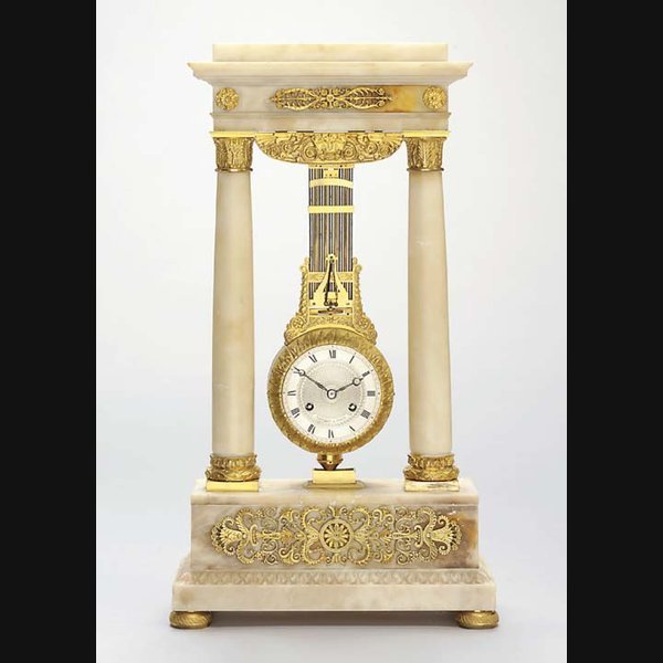 A Restauration alabaster and ormolu striking portico clock with integral swinging pendulum BÉCHOT, PARIS. CIRCA 1830