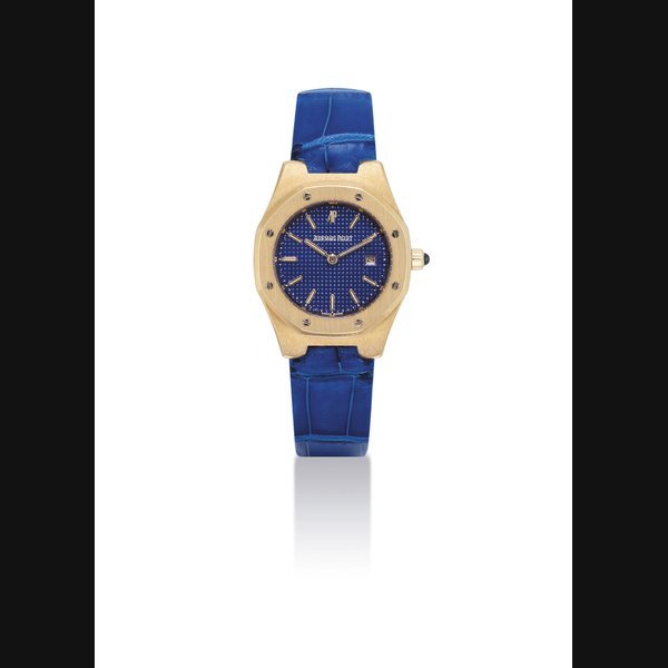 Audemars Piguet AUDEMARS PIGUET. A LADY'S 18K GOLD TONNEAU-SHAPED WRISTWATCH WITH DATE SIGNED AUDEMARS PIGUET, ROYAL OAK MODEL, NO. 105, CASE NO. D50082, CIRCA 1998