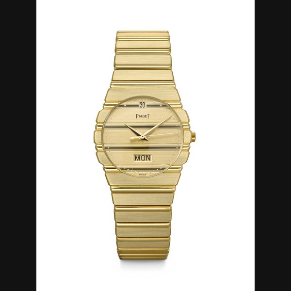 PIAGET. AN ATTRACTIVE 18K GOLD QUARTZ WRISTWATCH WITH DAY, DATE AND BRACELET POLO MODEL, REF. 15562 C 701, CASE NO. 472'706, MANUFACTURED IN 1987