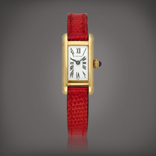 Cartier Mini Tank Américaine | A yellow gold wristwatch | Circa 1990