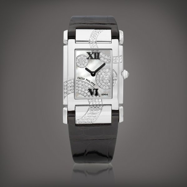 Patek Philippe Twenty~4, Reference 4914 | A white gold and diamond-set wristwatch with mother-of-pearl dial, Circa 2009 | 百達翡麗 | Twenty~4 型號4914 | 白金鑲鑽石腕錶，備珠母貝錶盤，約2009年製 · 4914