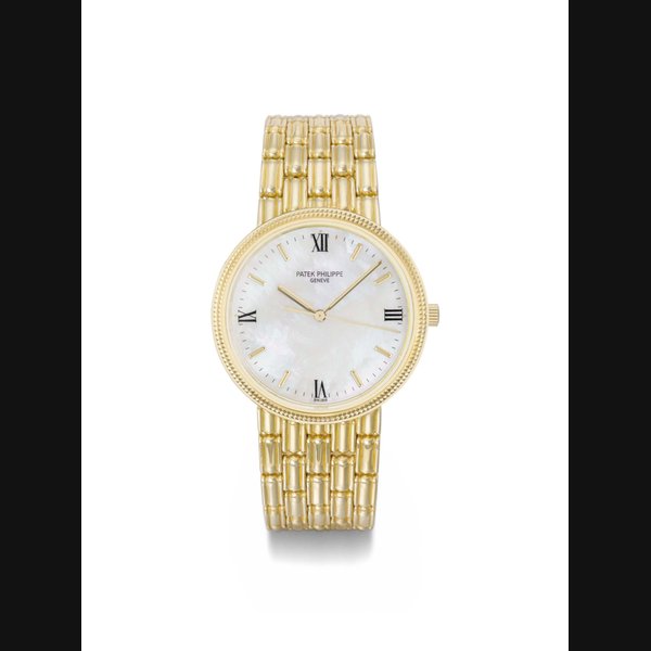 Patek Philippe. An 18K gold wristwatch with sweep centre seconds, mother-of-pearl dial, bracelet and later case SIGNED PATEK PHILIPPE, GENEVE, CALATRAVA MODEL, REF. 3944/20, MOVEMENT NO. 1'551'869, CASE NO. 2'843'160, CIRCA 1987