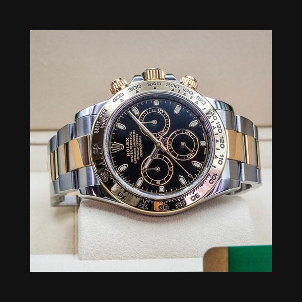 Rolex DaytonaCosmograph Daytona 116503 40mm Steel Gold Black Dial Box Papers 2018