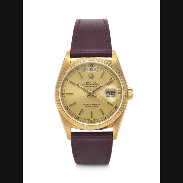 ROLEX, COVETED 18K GOLD ‘DAY-DATE’ WITH CHAMPAGNE DIAL, REF. 18038