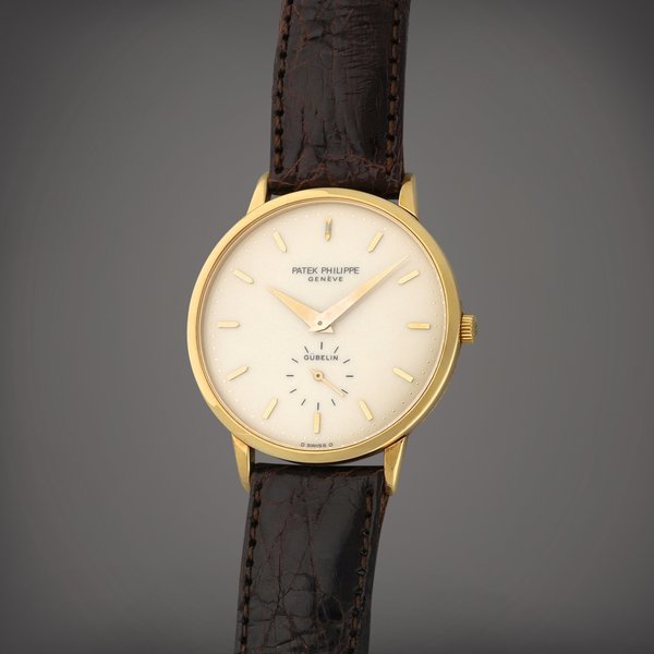 Patek Philippe Retailed by Gübelin: Calatrava, Reference 3893 | A yellow gold wristwatch | Circa 1984