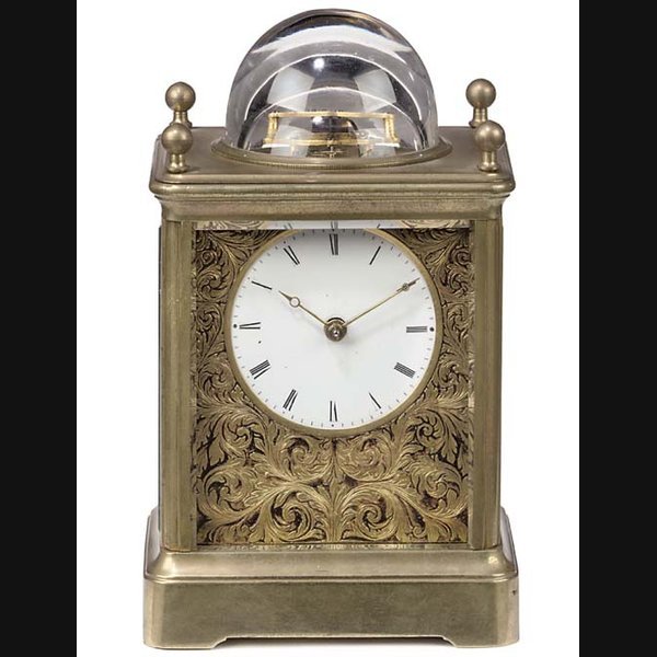 A brass striking carriage clock with visible escapement