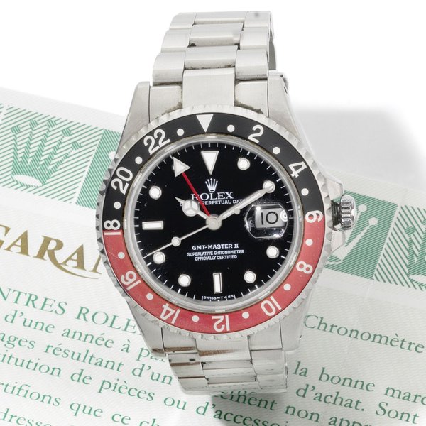Rolex. A stainless steel automatic calendar bracelet watch with dual time zone GMT-Master II, Ref:16710, Serial No.W18****, Movement No.690****, Circa 1994
