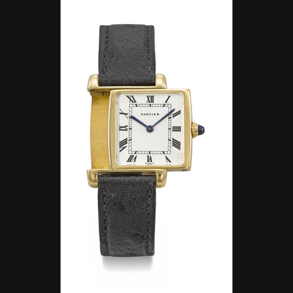 CARTIER. A RARE AND ATTRACTIVE 18K GOLD REVERSO WRISTWATCH SIGNED CARTIER, TANK REVERSO MODEL, CASE NO. 030'338, 60'173, CIRCA 1974