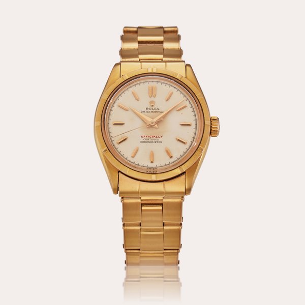 Rolex Reference 6285 Oyster Perpetual | An 18k yellow gold automatic watch with rivet bracelet, Circa 1963