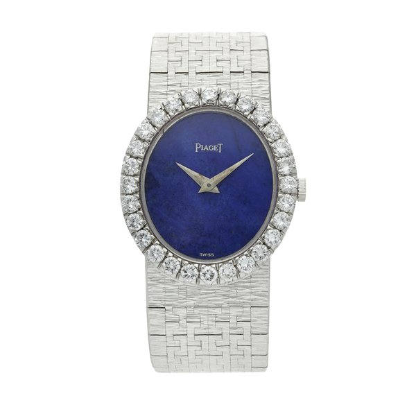 Piaget Reference 9814 A 6  A white gold and diamond-set bracelet watch with lapis lazuli dial, Circa 1976