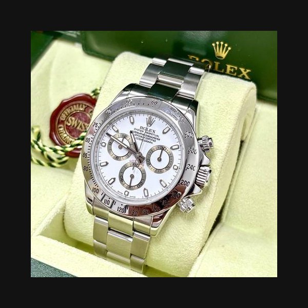 Rolex Rolex Daytona116520 40mm with a White Dial and Rolex Box + Papers
