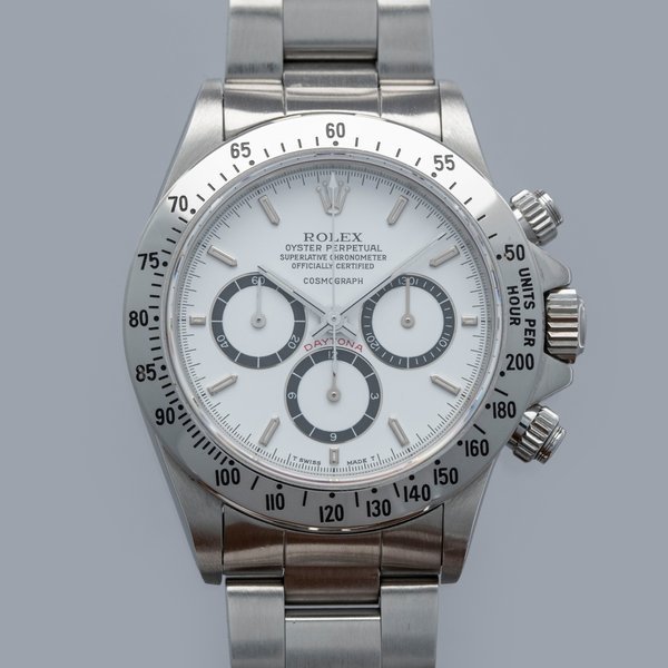 Rolex Rolex Cosmograph Daytona 16520 R Serial Floating White Dial Box and Papers