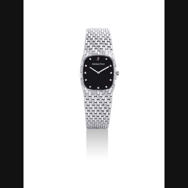Audemars Piguet AUDEMARS PIGUET. AN 18K WHITE GOLD AND DIAMOND-SET CUSHION-SHAPED BRACELET WATCH SIGNED AUDEMARS PIGUET, MOVEMENT NO. 385'704, CASE NO. D 37623, CIRCA 1980