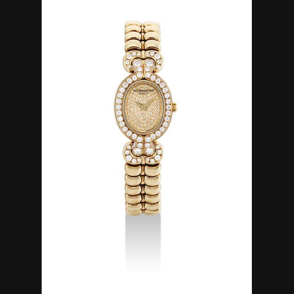 Vacheron Constantin VACHERON CONSTANTIN. A LADY'S 18K GOLD AND DIAMOND-SET OVAL BRACELET WATCH SIGNED VACHERON CONSTANTIN, GENEVE, CASE NO. 670'592, CIRCA 2000