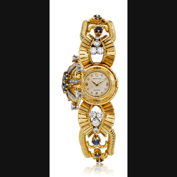 ROLEX, LADIES’ 18K, DIAMOND, AND SAPPHIRE CONCEALED WATCH