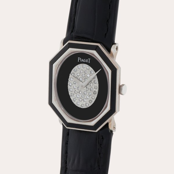 Piaget Reference 9341 | A white gold diamond and onyx-set wristwatch | Circa 1975