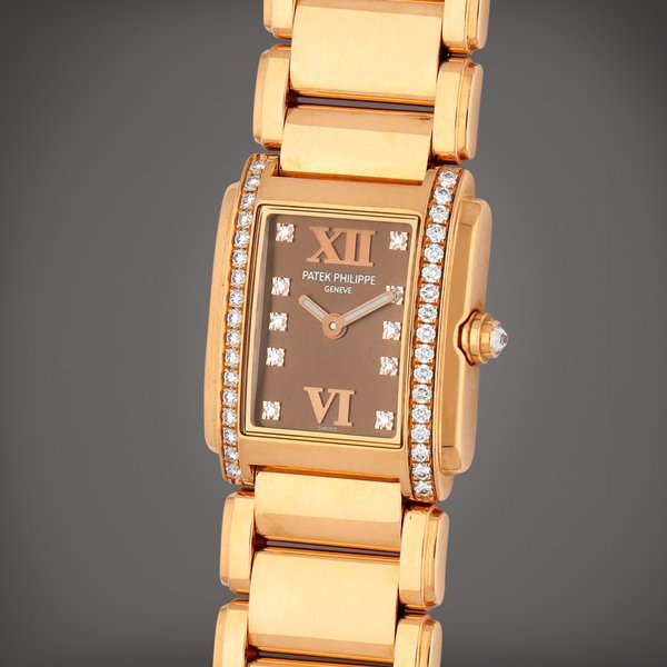 Patek Philippe Twenty-4, Reference 4908/11R | A pink gold and diamond-set wristwatch with bracelet | Circa 2002 · 4908/11R