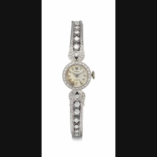 Rolex. A Lady's 18k White Gold and Diamond-set Bracelet Watch SIGNED ROLEX, PRECISION, NO. 228, CIRCA 1950