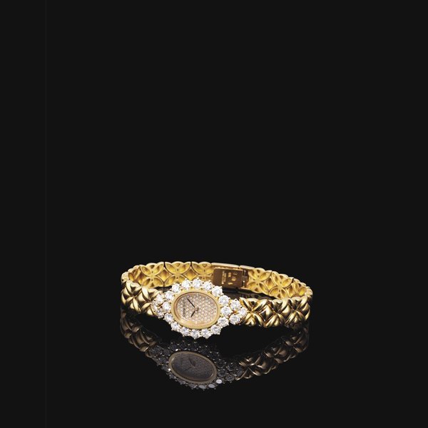 Audemars Piguet AUDEMARS PIGUET. A LADY'S 18K GOLD AND DIAMOND-SET OVAL BRACELET WATCH SIGNED AUDEMARS PIGUET, CASE NO. D57147, CIRCA 1995