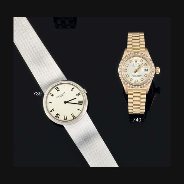 Rolex Rolex. A Lady's 18ct Gold and Diamond Automatic centre Seconds Water Resistant Wristwatch on 18ct Gold Bracelet with Calendar aperture SIGNED ROLEX, OYSTER PERPETUAL DATEJUST, CASE NO W811776, REF NO 69178, CIRCA 1997