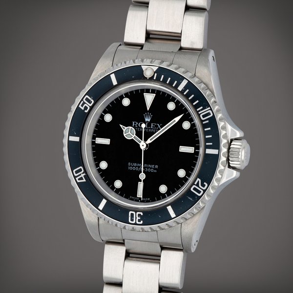 Rolex Submariner, Reference 14060M | A stainless steel wristwatch with bracelet | Circa 2002