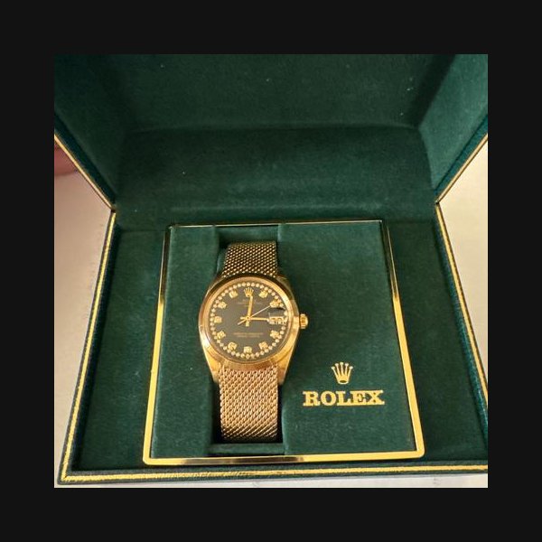 Rolex Oyster PerpetualDate 14k gold with mesh bracelet