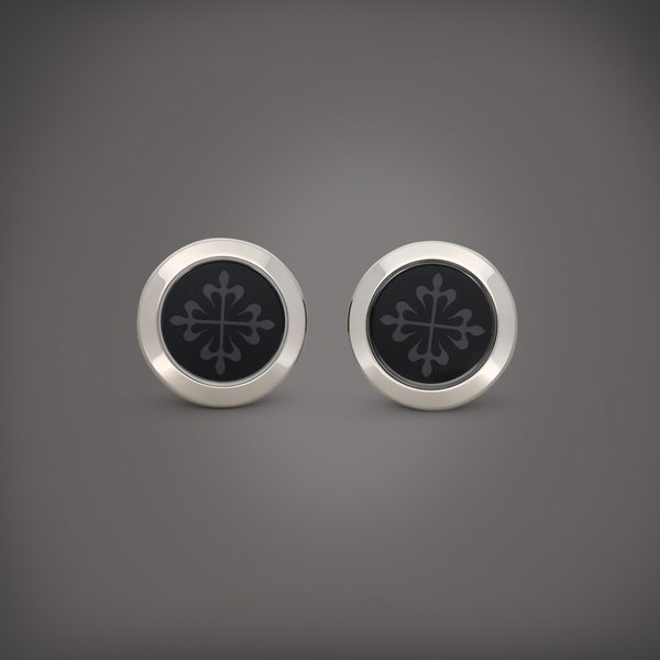 Patek Philippe A pair of white gold Calatrava cufflinks | Circa 2020