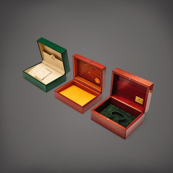 Rolex A set of three presentation boxes, Circa 1990 | 勞力士 | 一套三件盒子，約1990年製