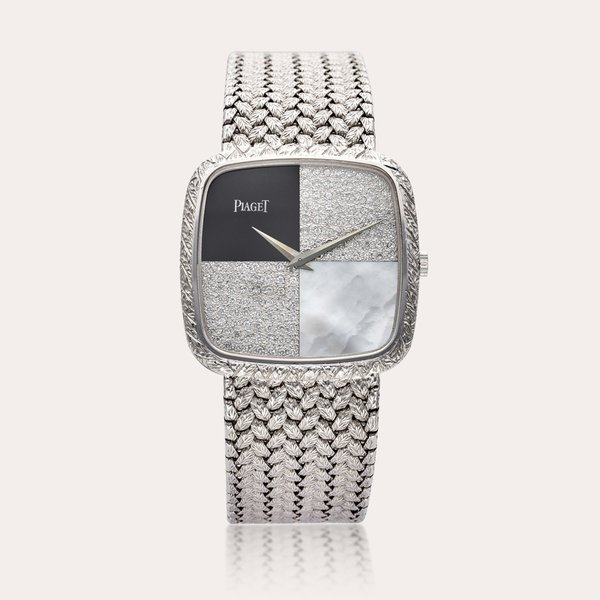 Piaget Reference 9771 D2 | A white gold and diamond-set cushion shaped bracelet watch with onyx and mother-of-pearl dial, Circa 1975