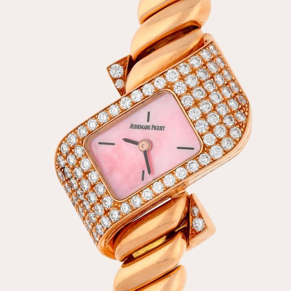 Audemars Piguet A pink gold and diamond-set bracelet watch with mother-of-pearl dial | Circa 1998