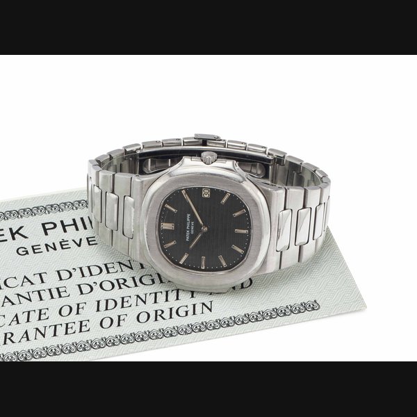 Patek Philippe. A Large Stainless Steel Automatic Wristwatch with Date and Bracelet SIGNED PATEK PHILIPPE, GENEVE, NAUTILUS MODEL, REF. 3700/1, MOVEMENT NO. 1'304'480, CASE NO. 534'296, MANUFACTURED IN 1978