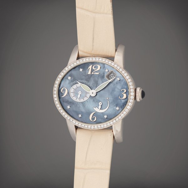 Girard-Perregaux Cat's Eye, Reference 80481 | A white gold and diamond-set wristwatch with date, power reserve indication and mother-of-pearl and diamond-set dial | Circa 2007 · 80481
