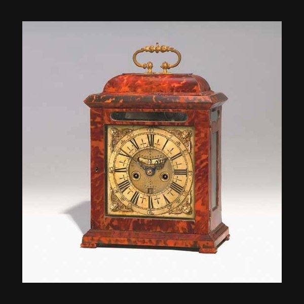 A Queen Anne turtleshell striking table clock with quarter repeat HENRY MASSY, LONDON. CIRCA 1705