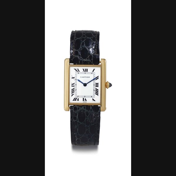 CARTIER. AN 18K GOLD RECTANGULAR WRISTWATCH SIGNED CARTIER, TANK MODEL CASE NO. 9601192947, CIRCA 1998