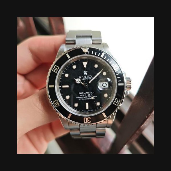Rolex Rolex Submariner DateRare 168000 "Triple Zero" with Box and Papers