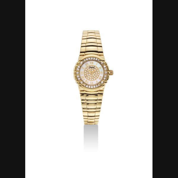 Piaget PIAGET. A LADY'S 18K GOLD AND DIAMOND-SET WRISTWATCH WTIH BRACELET AND MOTHER-OF-PEARL DIAL SIGNED PIAGET, TANAGRA MODEL, REF. 16033 M 401D, CASE NO. 597'619, CIRCA 1995 · 16033