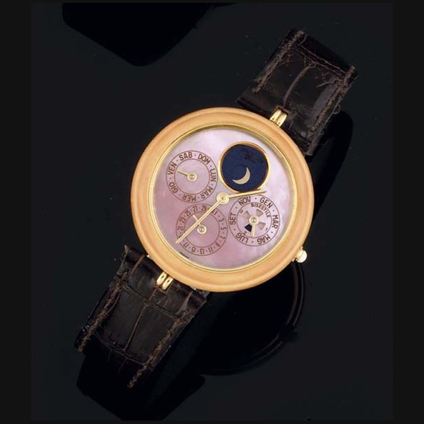 Gerald Genta. An 18ct Gold and yellow Hard Stone Automatic Perpetual wristwatch with mother of pearl dial SIGNED GERALD GENTA, CASE G26358-25020, CIRCA 1990